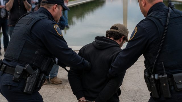 Reflecting Pool Controversy: Arrests Amid Vandalism Claims
